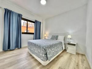 A bed or beds in a room at Juan XXIII