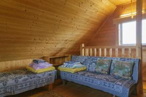Posezení v ubytování Private house in Karumati Leisure Center