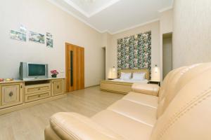 Μια τηλεόραση ή/και κέντρο ψυχαγωγίας στο Apartment Baseina Khreschatyk