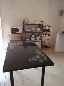 Kuchyň nebo kuchyňský kout v ubytování Sunshinevibe guest house