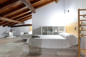 Postel nebo postele na pokoji v ubytování Ondarbaso Apartamentos Rurales III