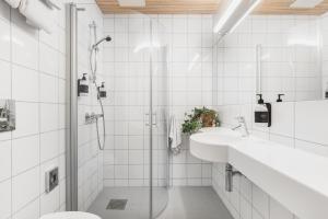 Koupelna v ubytování Heimen Hotel