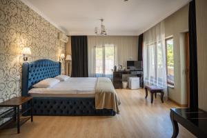 Кровать или кровати в номере Opus View