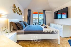 Postel nebo postele na pokoji v ubytování Prime Apartments "Los Diamantes" + 62 fotografií