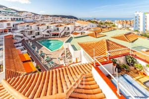 Bazén v ubytování Prime Apartments "Los Diamantes" nebo v jeho okolí