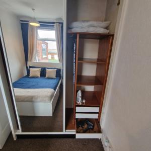 En eller flere senge i et værelse på Double room in Heaton
