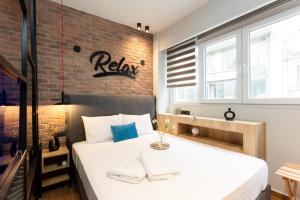 Valaoritou 3 Luxury Rooms客房内的一张或多张床位