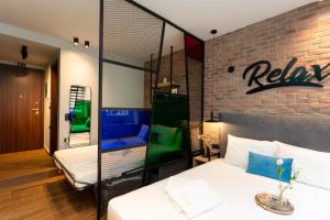 Valaoritou 3 Luxury Rooms客房内的一张或多张床位