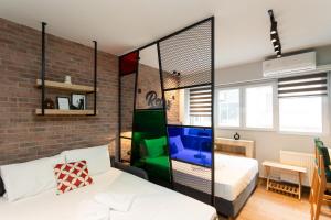 Valaoritou 3 Luxury Rooms客房内的一张或多张床位