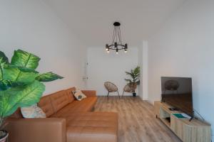 TV a/nebo společenská místnost v ubytování Terracota Apartment + 15 fotografií