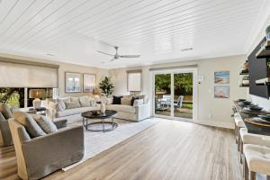 a living room with a couch and a table at 672 Queens Grant in Hilton Head Island