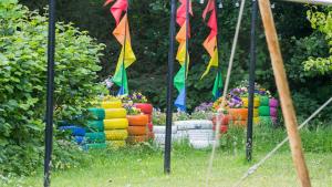 a group of colorful umbrellas and flowers in a garden at Brithdir Mawr in Bangor