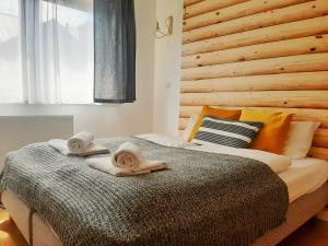 Posteľ alebo postele v izbe v ubytovaní Apartamenty Złoty Widok