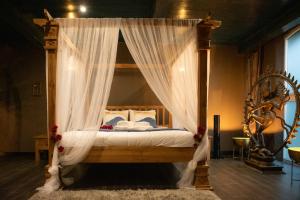 Postel nebo postele na pokoji v ubytování Suite Wellness