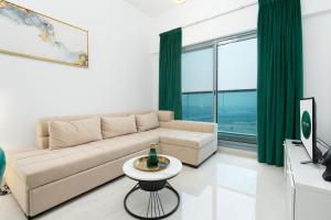 Posezení v ubytování The Elite Apartment + 18 fotografií