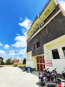 a group of motorcycles parked in front of a building at Sunrise Homestay Agra Near Taj Mahal in Agra