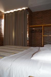 Postel nebo postele na pokoji v ubytování Chalés Estrada Real