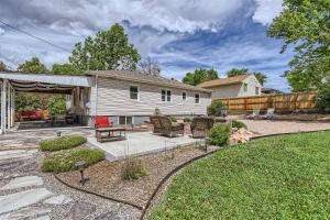 a yard with a patio and a house at 6224 S Datura St in Littleton