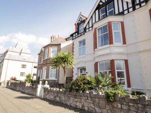 a row of houses on a street at The Keep in Llandudno