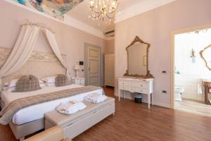 Letto o letti in una camera di Hotel Ristorante Ala d'Oro