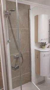 Ένα μπάνιο στο Ferienwohnung Eleni