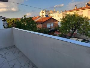 a view of a city from a balcony at Jordanovi Premium Apartment in Kavadarci