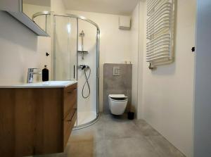 Kúpeľňa v ubytovaní Hugo VIP Apartments