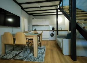 Kuchyňa alebo kuchynka v ubytovaní Hugo VIP Apartments