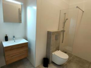 Kúpeľňa v ubytovaní Hugo VIP Apartments