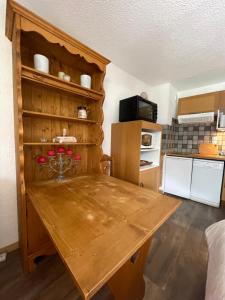 Η κουζίνα ή μικρή κουζίνα στο Superbe studio au pied des oeufs +8 φωτογραφίες