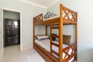 Postel nebo postele na pokoji v ubytování Apartamento Guarujá Praia Tombo