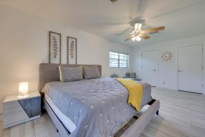 a bedroom with a bed and a ceiling fan at Florida Vacation Rental Near Historic Downtown in St. Augustine