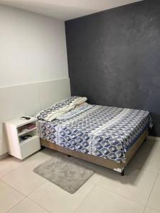 Voodi või voodid majutusasutuse Apartamento 1 quarto Zona Sul Praia toas