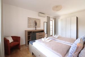 Postel nebo postele na pokoji v ubytování Naturtalente Berghaus - Moonlakeview Big