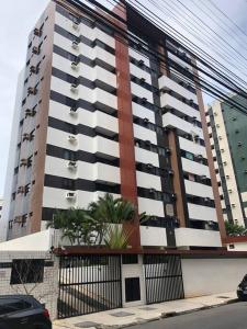a large building with balconies on the side of it at Paraíso Ponta Verde região nobre in Maceió +27 photos