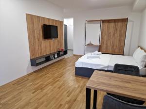 Ένα ή περισσότερα κρεβάτια σε δωμάτιο στο Luxury Apartment IVA III