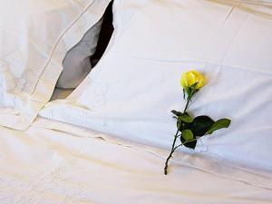 Postel nebo postele na pokoji v ubytování Guesthouse Rousis