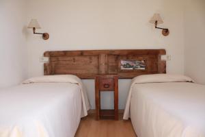 Cama o camas de una habitación en Casa Rural Vilaspasa, alquiler integro