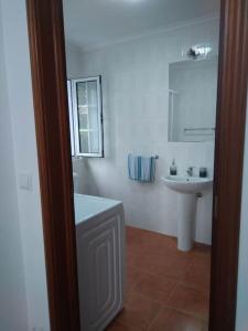 Et badeværelse på Casa dos Novelões