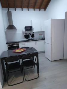 Køkken eller tekøkken på Casa dos Novelões