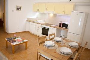 Η κουζίνα ή μικρή κουζίνα στο Jókai Apartman