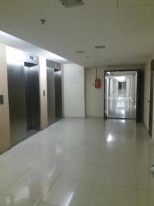 an empty hallway of a building with at Nazrins Studio Apartment KBCP in Kota Bharu