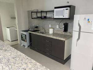 Kuchyň nebo kuchyňský kout v ubytování A Jóia de Costa Azul, a 50 Mt da praia