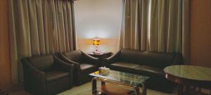 Posezení v ubytování Al Ghadeer Hotel Apartment