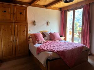 Postel nebo postele na pokoji v ubytování Fleur des Neiges