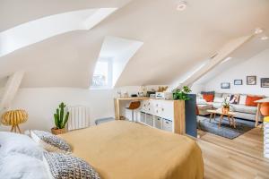 Posteľ alebo postele v izbe v ubytovaní Cocoon au coeur de Nantes