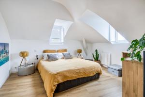 Posteľ alebo postele v izbe v ubytovaní Cocoon au coeur de Nantes