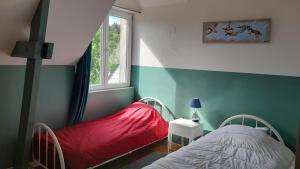 Krevet ili kreveti u jedinici u okviru objekta Grande maison, calme, proche de la mer