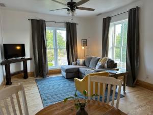 a living room with a couch and a table at The Cottage at 241 North in St. George