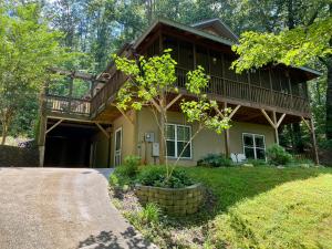 a house with a porch and a pathway leading to it at New Listing! Mountainview Escape in Dahlonega